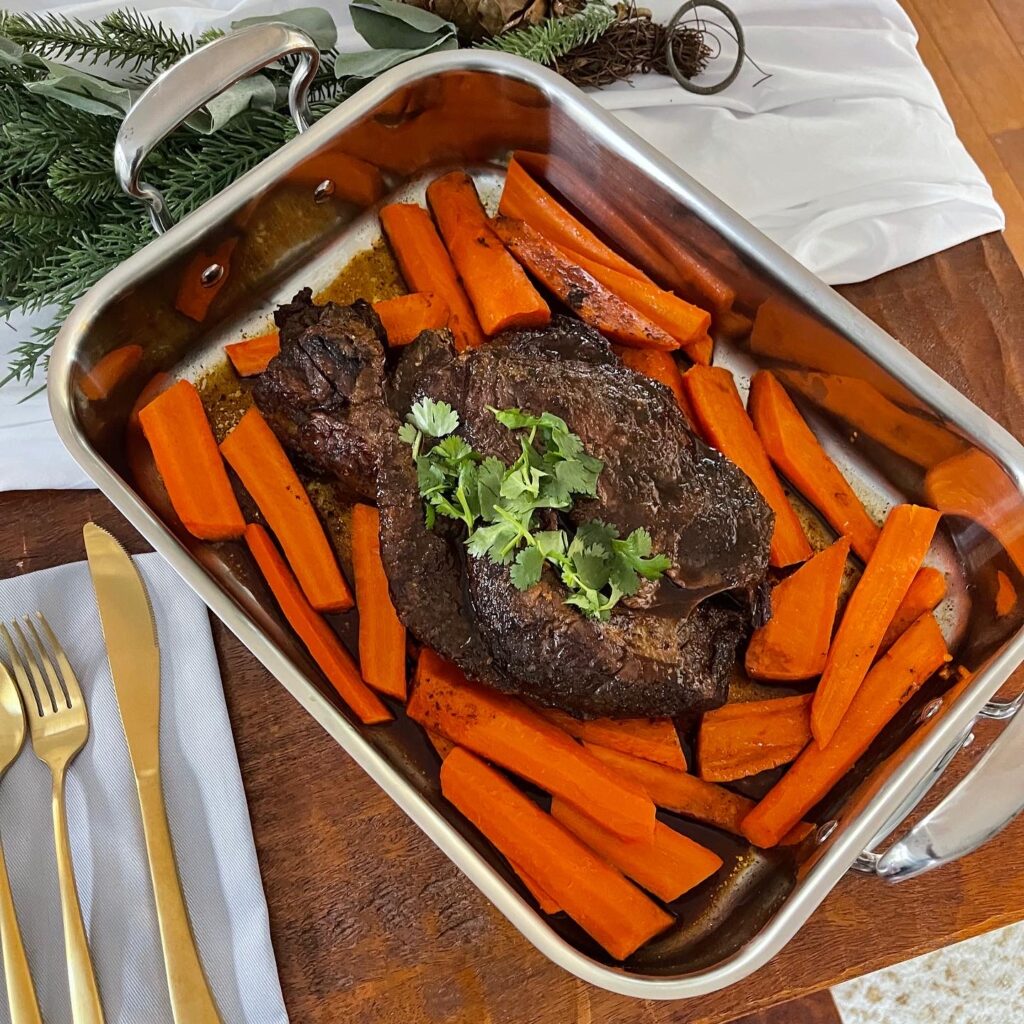 Super easy, juicy, melt-in-your mouth baked pot roast with carrots!